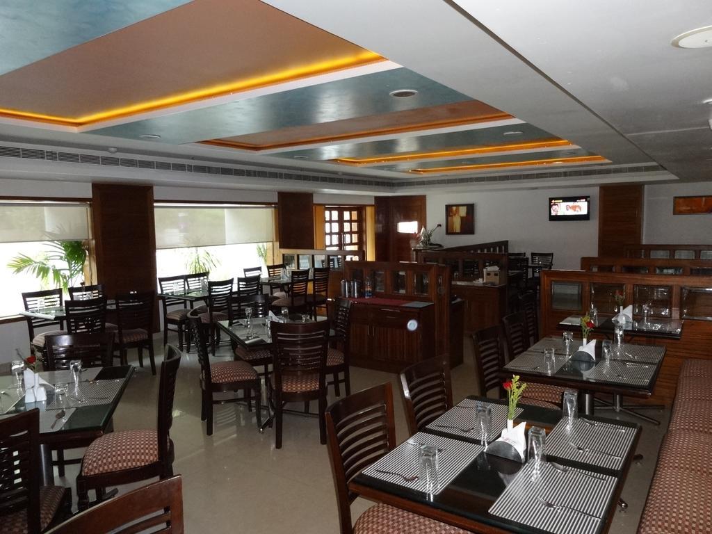 La Hospin Hotel Rājahmundry Szoba fotó