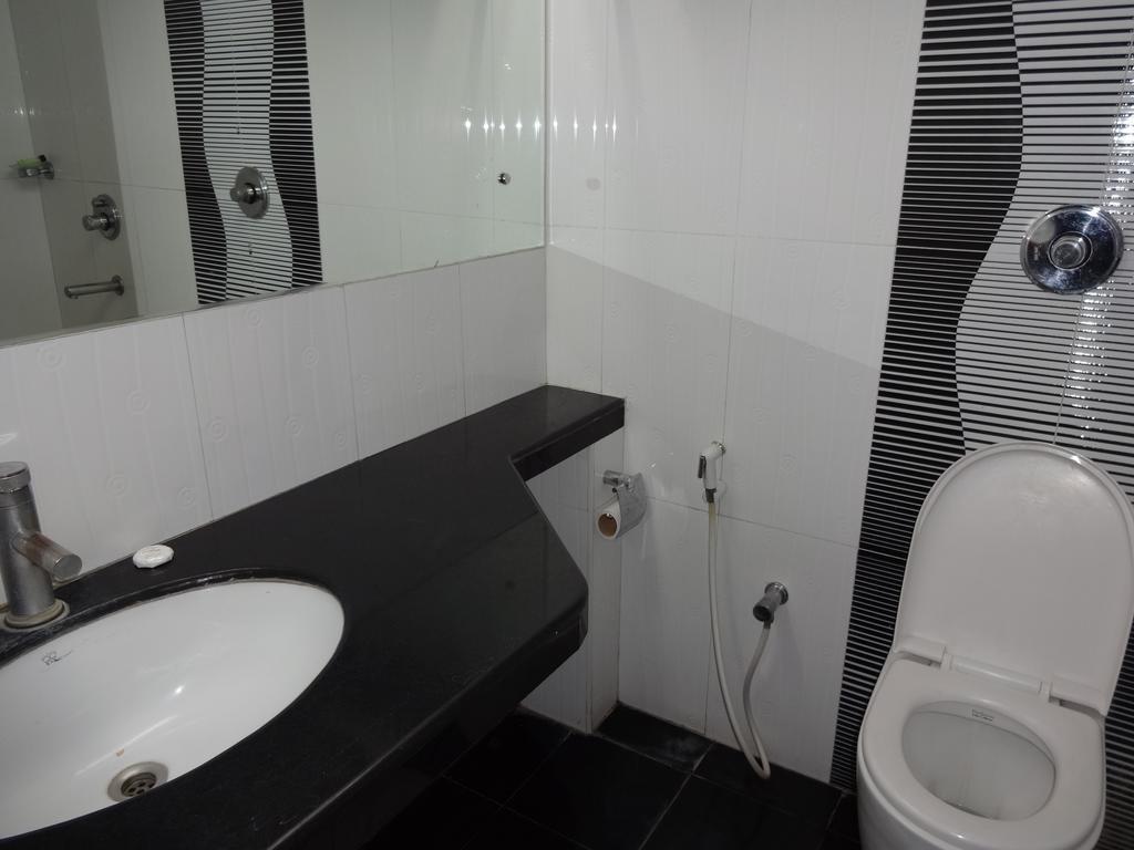 La Hospin Hotel Rājahmundry Szoba fotó
