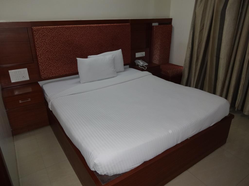 La Hospin Hotel Rājahmundry Szoba fotó