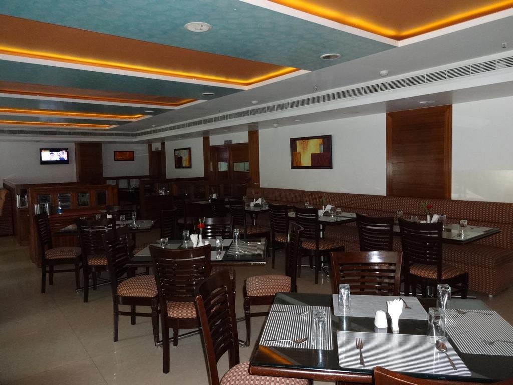 La Hospin Hotel Rājahmundry Szoba fotó