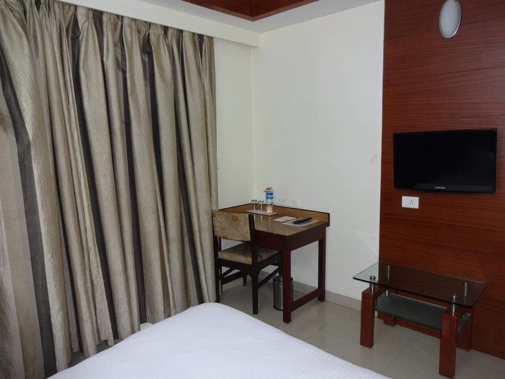 La Hospin Hotel Rājahmundry Szoba fotó